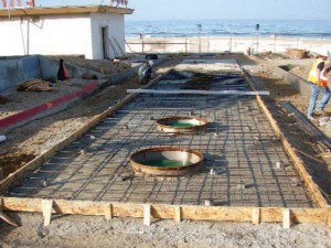 Malibu beach installation of below-grade wastewater tanks